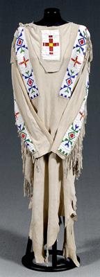 Appraisal: Beaded hide dress sinew sewn probably deerskin yoke sleeves front