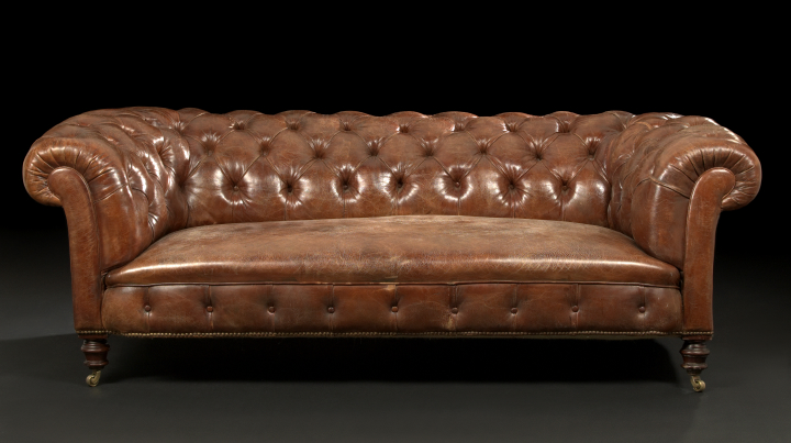 Appraisal: Edwardian Mahogany and Leather-Upholstered Chesterfield Sofa ca the tufted and