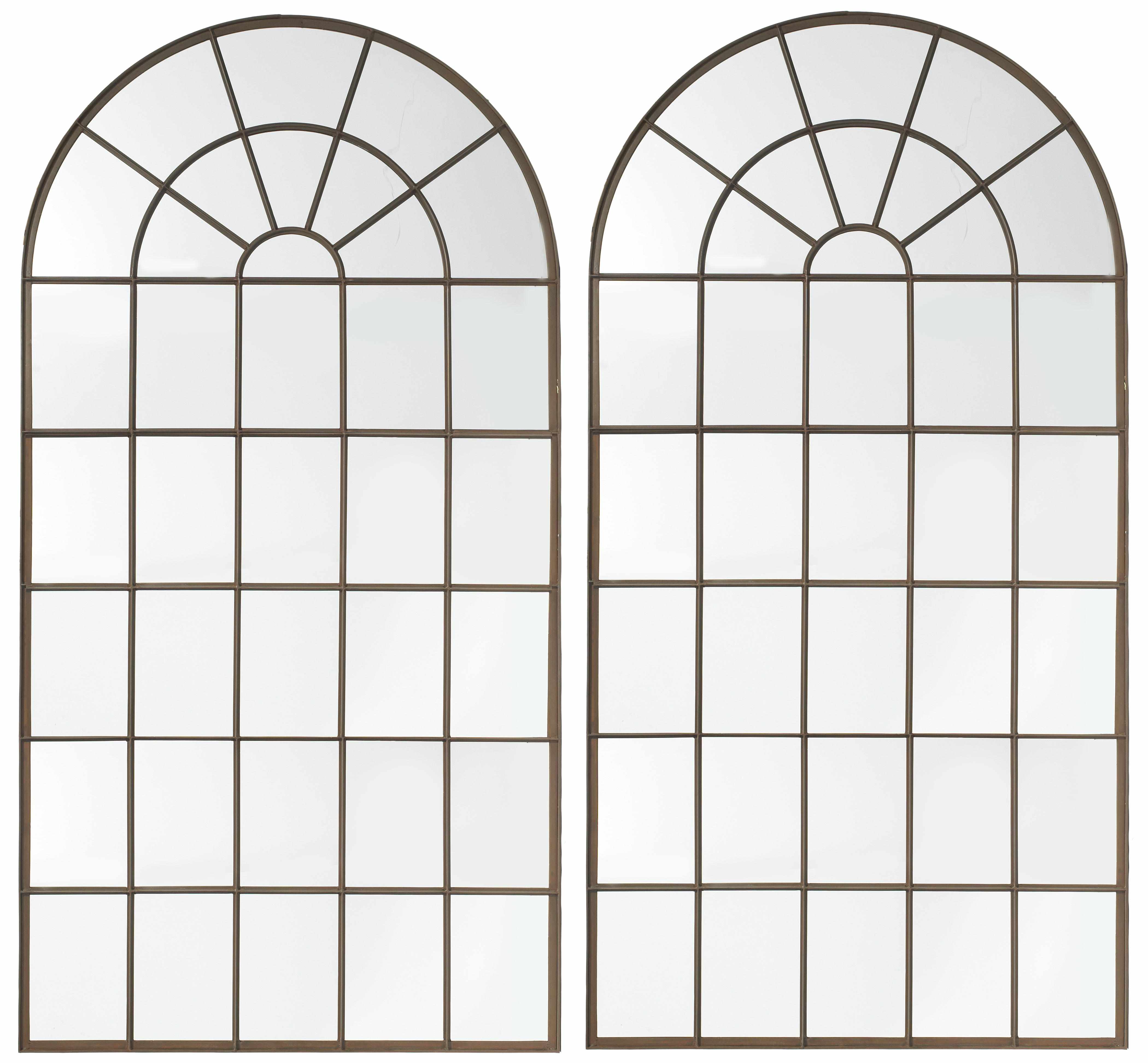 Appraisal: An imposing pair of Neoclassical patinated metal mirrors of arched