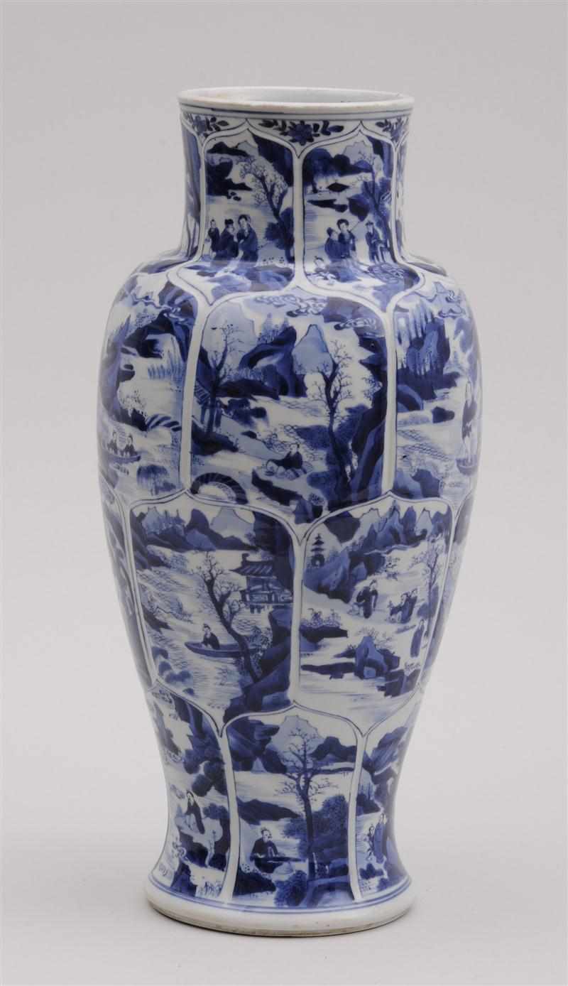 Appraisal: KANG XI BLUE AND WHITE PORCELAIN BALUSTER-FORM VASE Underglaze leaf