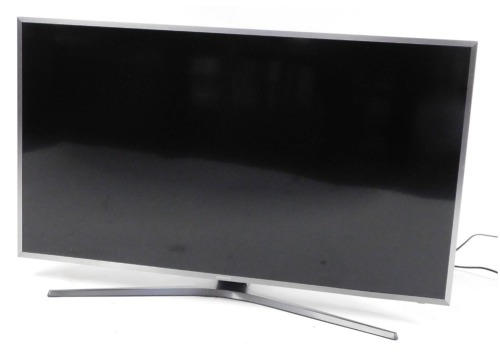 Appraisal: A Samsung flat screen TV with remote