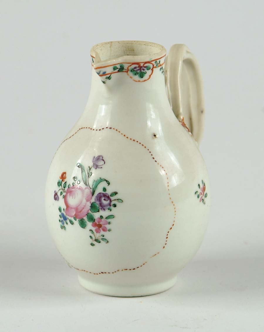 Appraisal: STRAP HANDLED CHINESE EXPORT CREAMER Floral decorated in bulbous shape