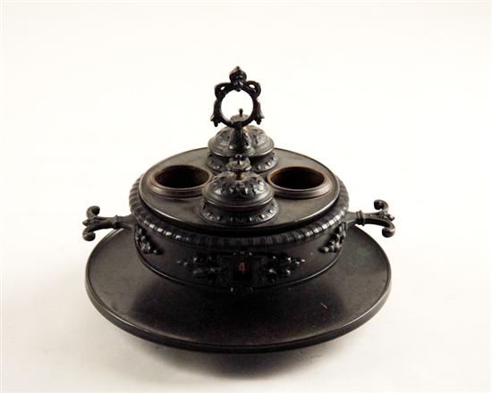 Appraisal: A Cast Metal Inkwell round pot with two open wells