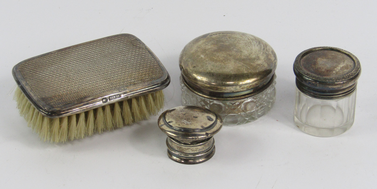 Appraisal: A George V silver backed clothes brush with engine turned