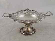 Appraisal: A two handled silver sweet dish on pedestal foot with