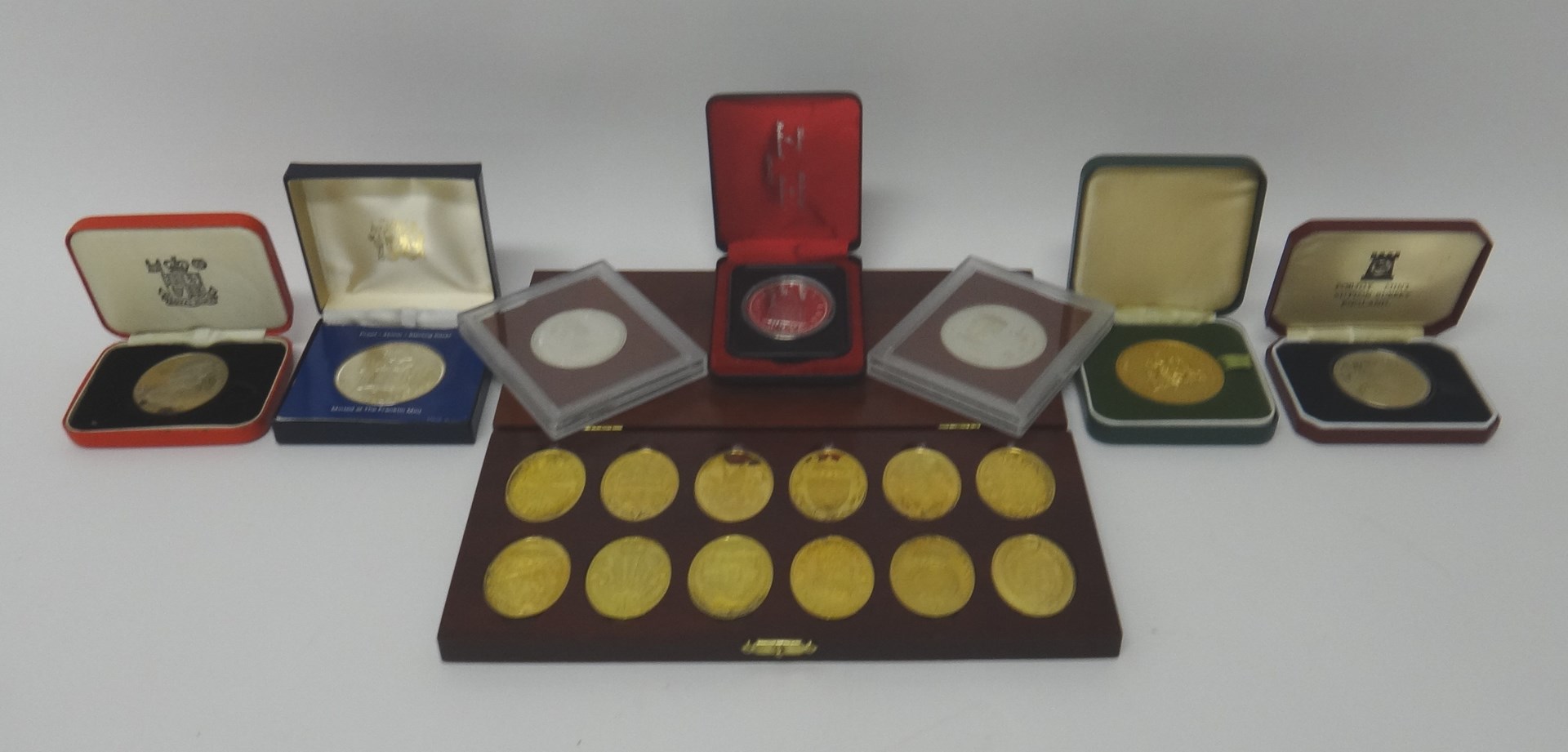 Appraisal: A set of twelve oval silver gilt medallions commemorating The