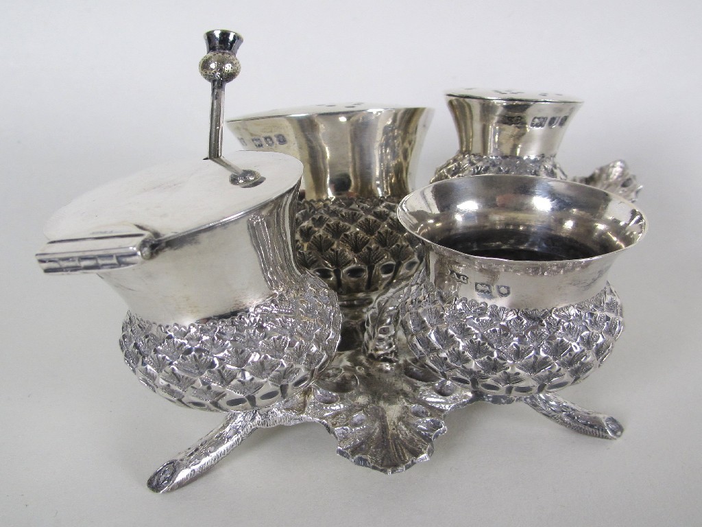 Appraisal: A silver and silver plated thistle cruet the leaf thumb