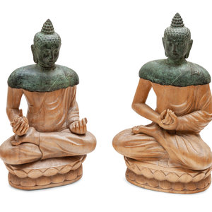 Appraisal: A Pair of Bronze and Carved Wood Seated Buddhas Southeast