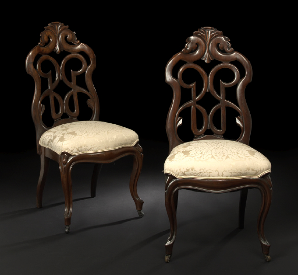 Appraisal: Pair of American Rococo Revival Laminated Rosewood Slipper Chairs mid-