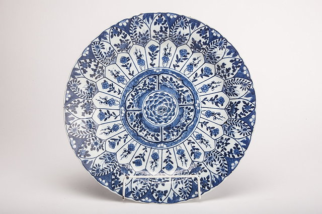 Appraisal: A CHINESE BLUE AND WHITE CHARGER decorated floral designs in