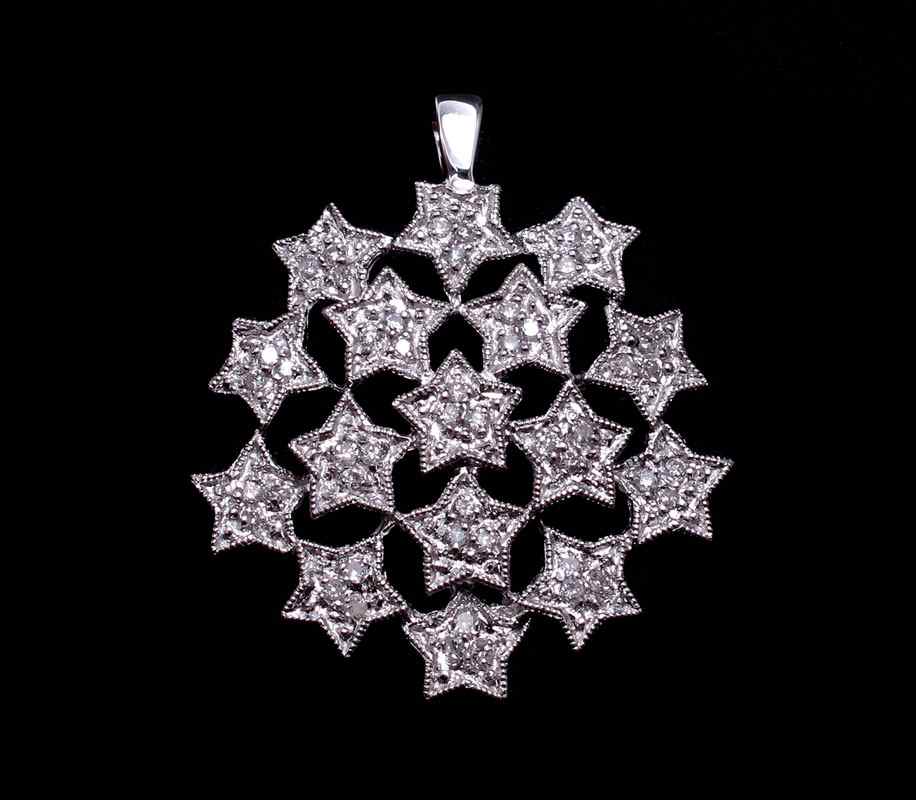 Appraisal: K GOLD DIAMOND SNOWFLAKE PENDANT K white gold pendant contains