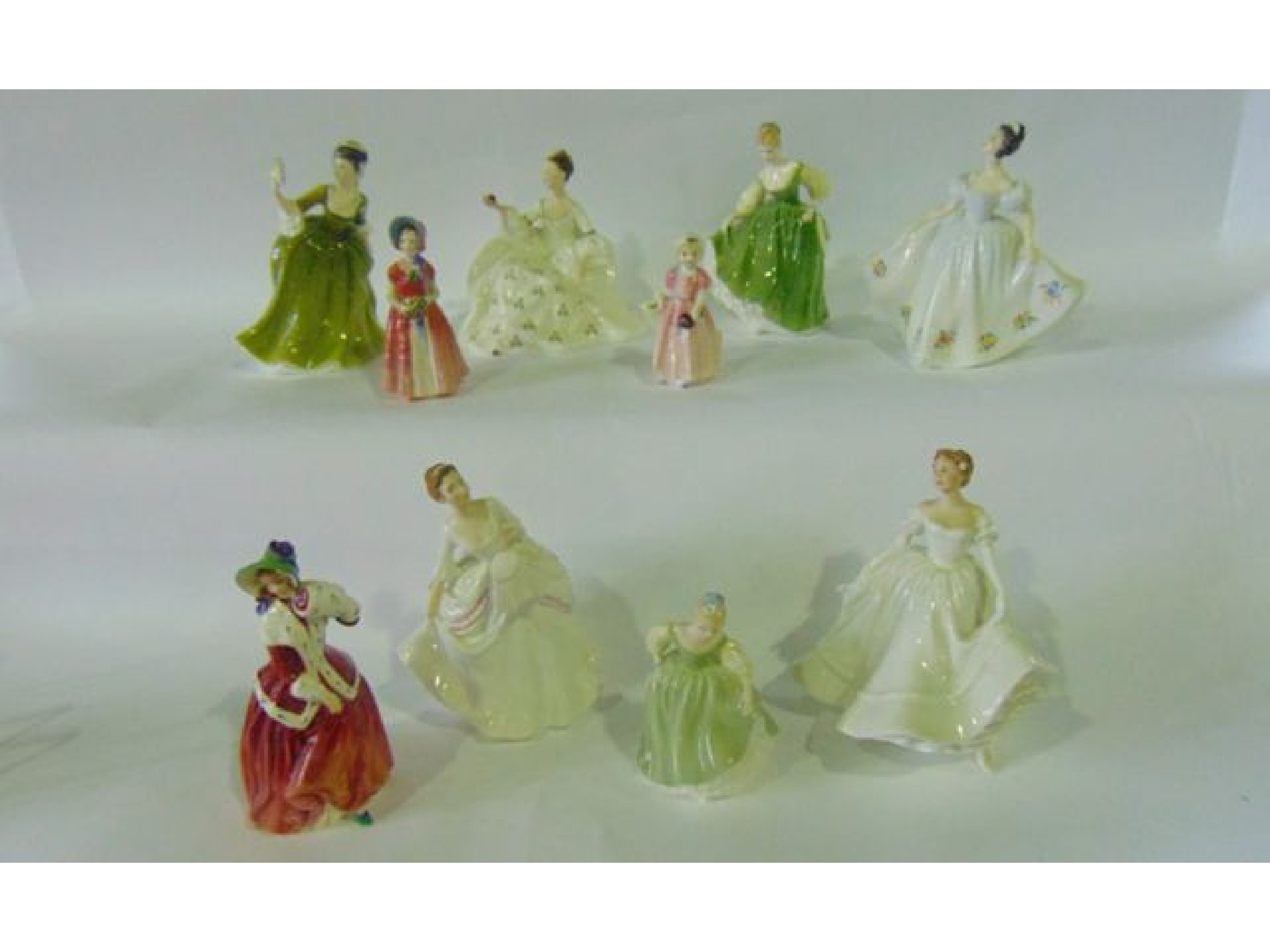 Appraisal: A collection of Royal Doulton figures including Fair Maiden HN