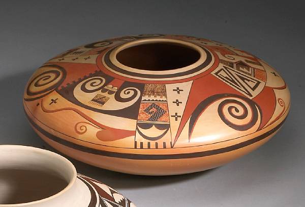 Appraisal: A Hopi polychrome jar Fawn Navasie painted asymmetrically with recurring