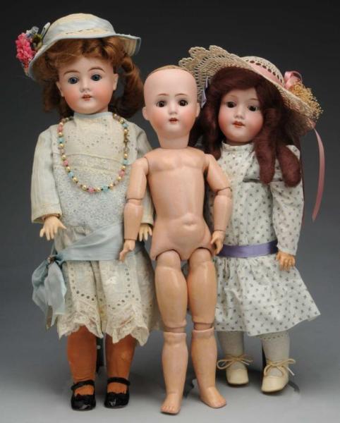 Appraisal: Lot of German Bisque Dolls Description Germany Ca Bisque socket