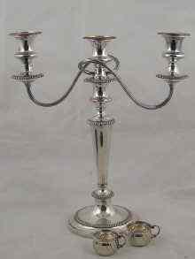 Appraisal: A silver plate three light candelabrum ht cm and a