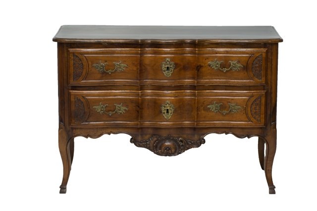 Appraisal: A th century French carved fruitwood serpentine two drawer commode