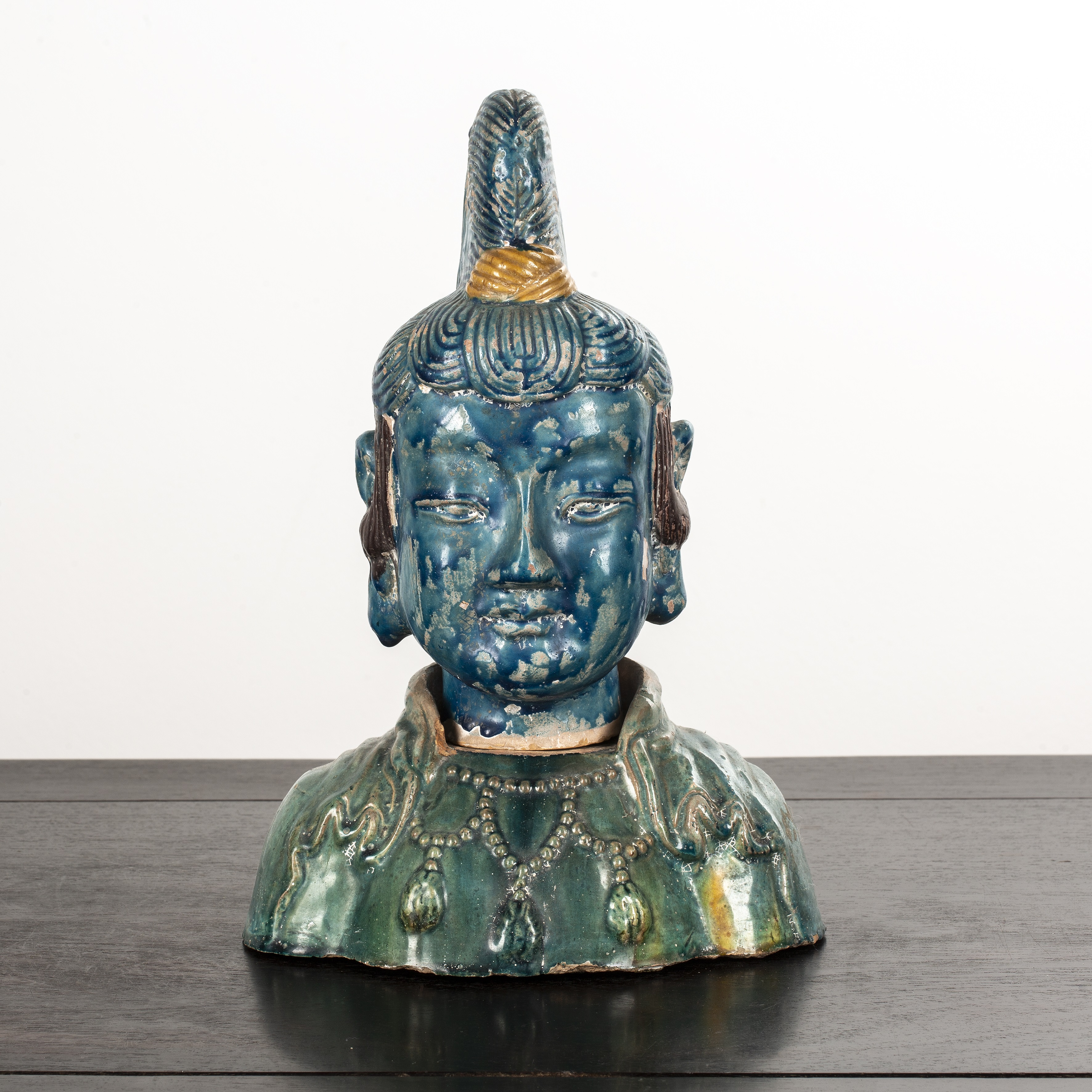 Appraisal: Glazed porcelain model of Guanyin's headChinese decorated in turquoise and