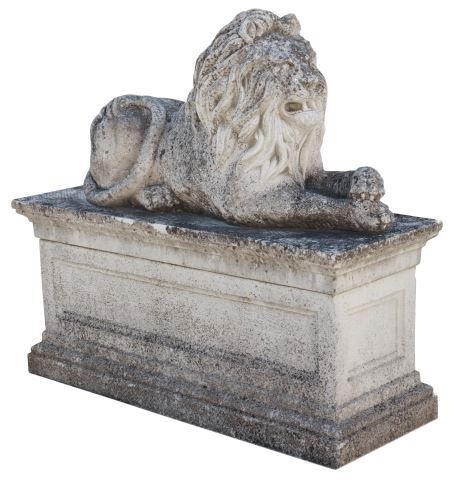 Appraisal: Monumental cast stone garden statuary Recumbent Lion th c on