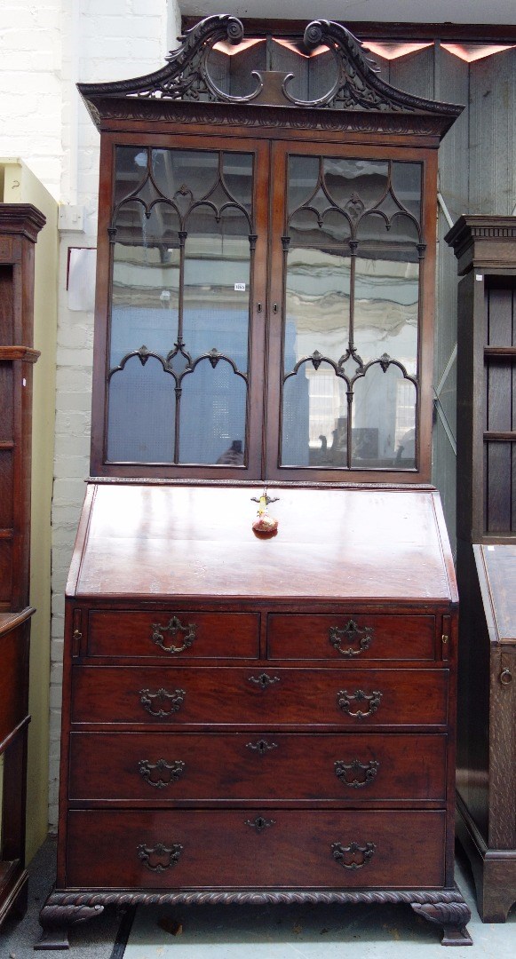 Appraisal: A th century mahogany bureau bookcase the pierced and carved