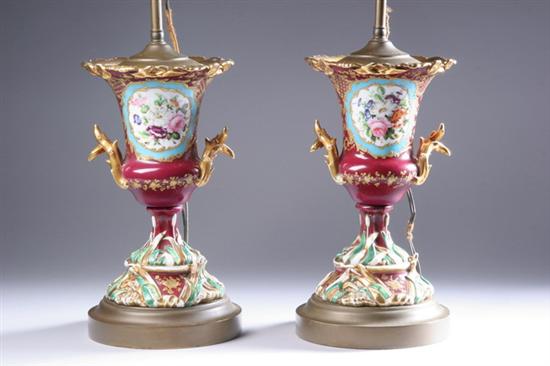 Appraisal: PAIR OF PARIS PORCELAIN URNS th century Magenta ground each