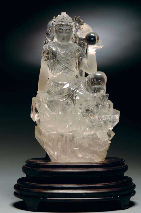 Appraisal: CARVED ROCK CRYSTAL GUANYIN Tall Chinese carved rock crystal Guanyin