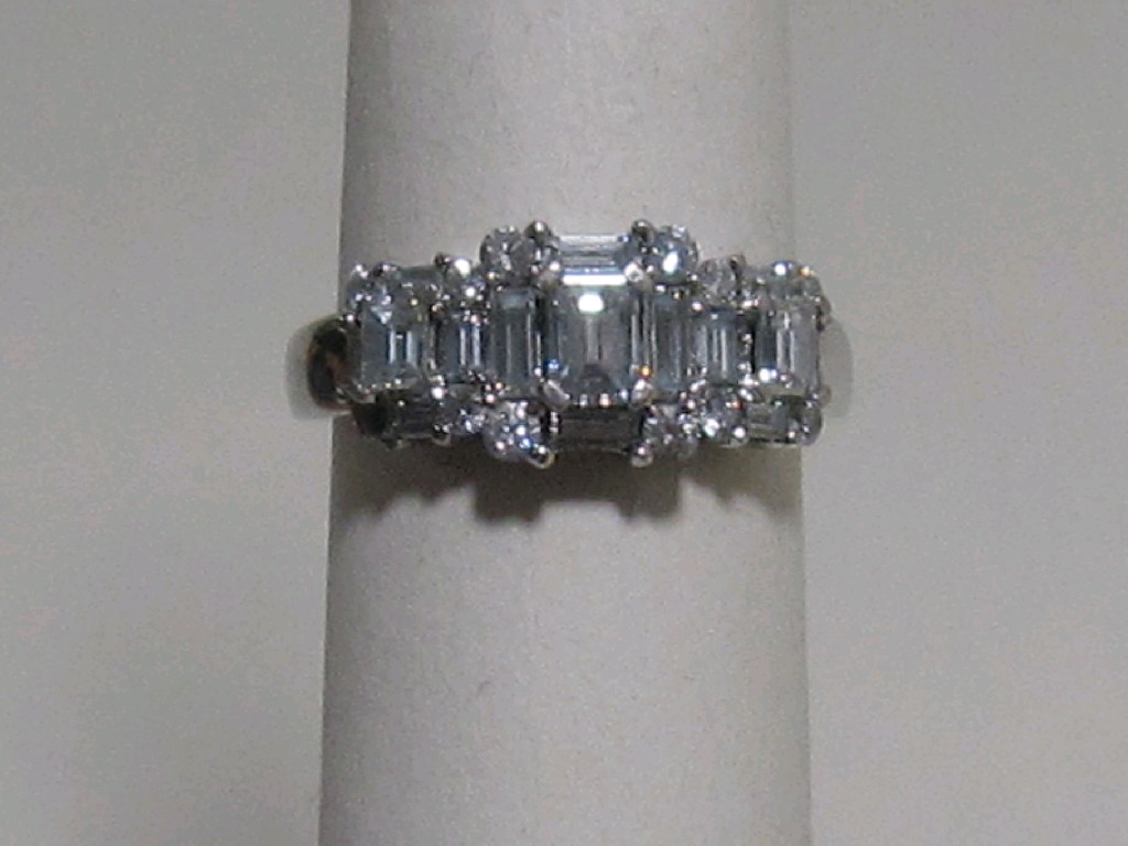 Appraisal: Eighteen carat white gold diamond cluster ring with baguette and