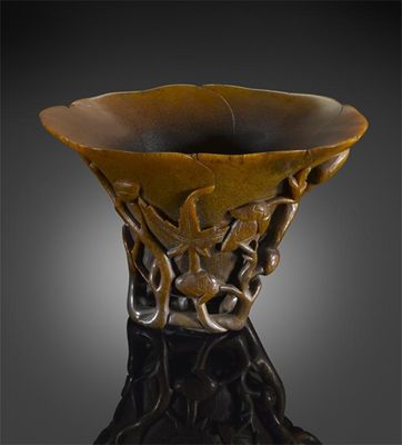 Appraisal: A Chinese rhinoceros horn libation cup carved as a large