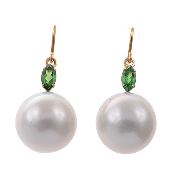 Appraisal: A PAIR OF SOUTH SEA PEARL AND TSAVORITE GARNET EARRINGS