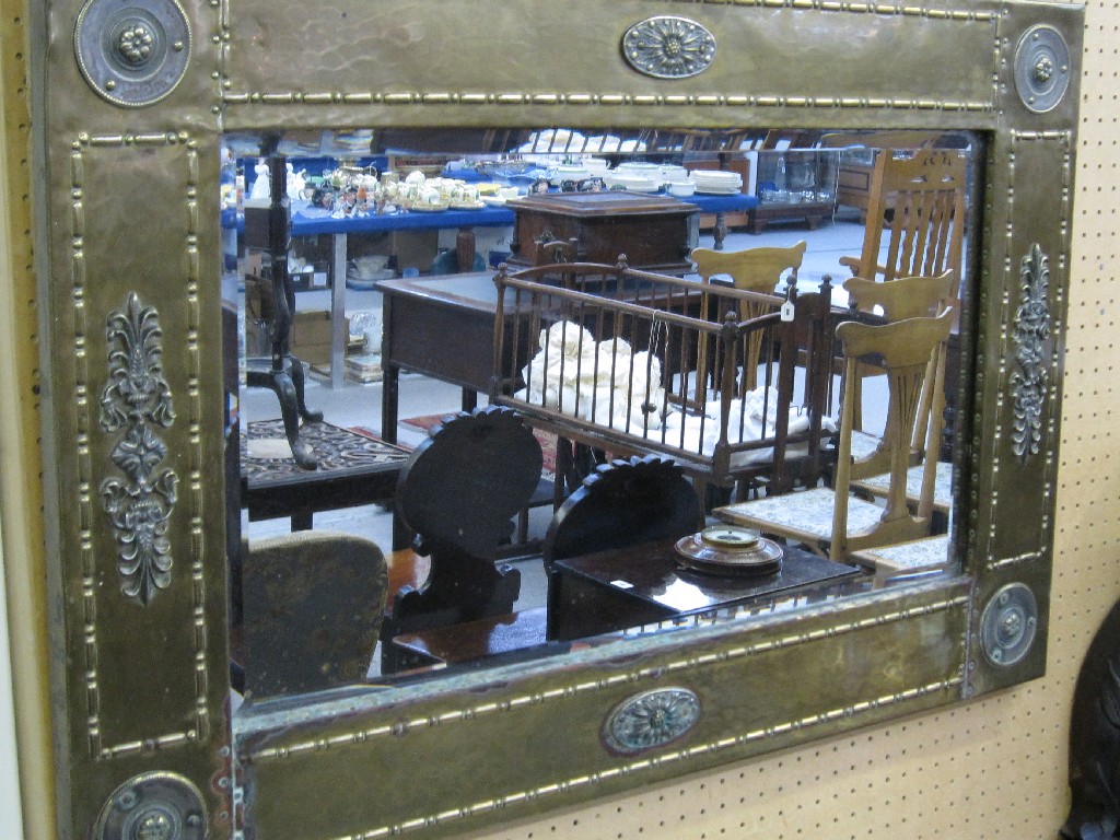 Appraisal: Brass framed rectangular mirror with applied roundels and foliate decoration