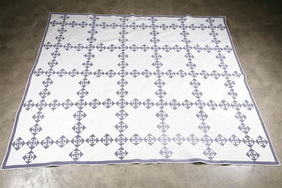 Appraisal: BLUE AND WHITE QUILT Twentieth century hand-stitch and handquilted in