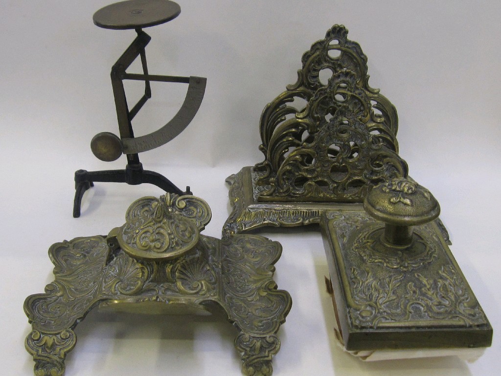 Appraisal: Cast brass desk set comprising inkwell letter rack and desk