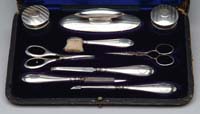 Appraisal: NINE PIECE CASED STERLING MANICURE SET Hallmarked maker s mark