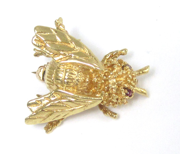 Appraisal: RUBY AND FOURTEEN KARAT GOLD BUMBLE BEE BROOCH with a