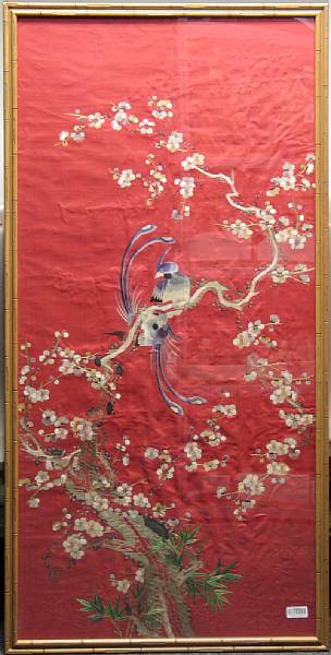 Appraisal: An embroidered silk panel Framed and glazed embroidered in bright