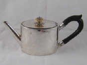 Appraisal: Military interst A Georgian silver oval drum teapot with straight