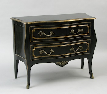 Appraisal: A Petite Lacquered Commode Black lacquered bow front two drawer