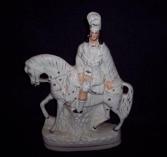 Appraisal: A Staffordshire figure of a Highlander on horseback cm high