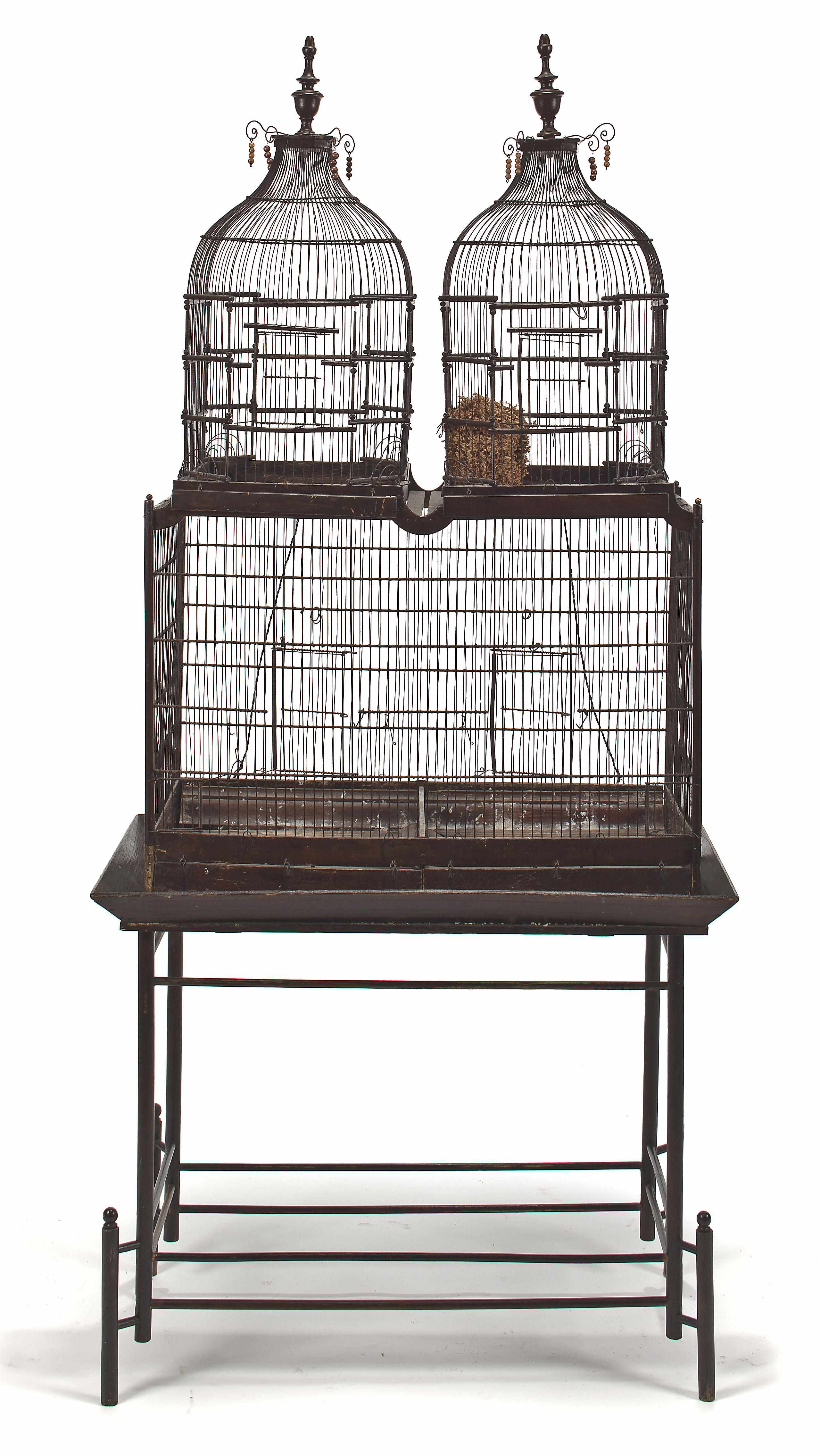 Appraisal: A Victorian style wirework birdcage on stand Of double domed