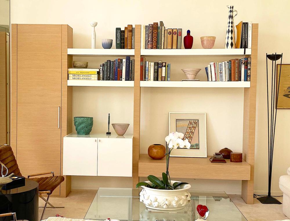 Appraisal: CONTEMPORARY ENTERTAINMENT DISPLAY WALL UNITThe blond wood supports and shelves