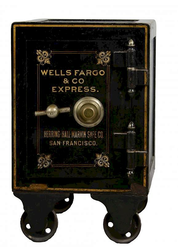 Appraisal: Wells Fargo Cast Iron Safe On Wheels Black cast iron