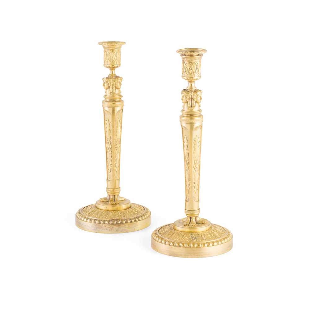 Appraisal: PAIR OF FRENCH EMPIRE GILT BRONZE CANDLESTICKS TH CENTURY the