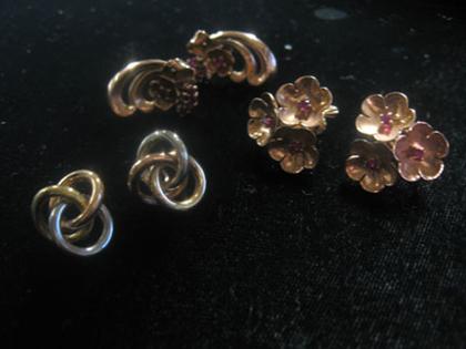 Appraisal: Three pairs yellow gold earrings One with three flowers one