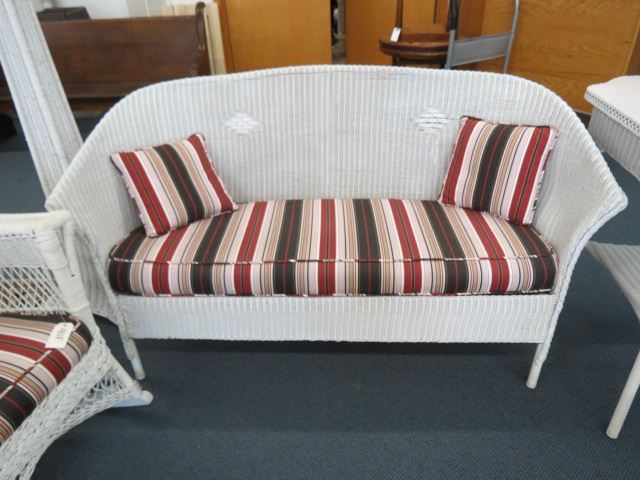 Appraisal: Antique Wicker Sofa wide recent upholstery