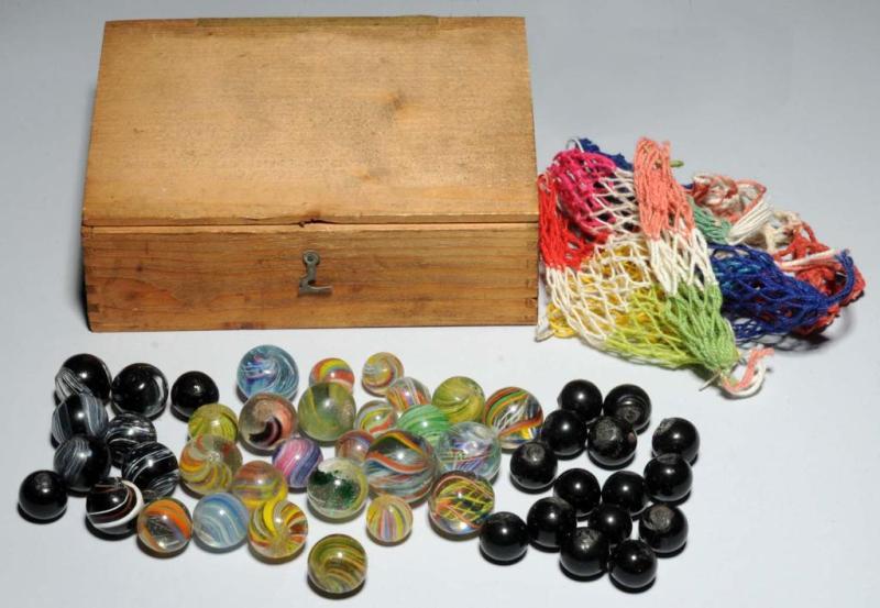 Appraisal: Firma Louis Muller Son Box of Marbles Description Box contains