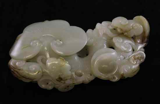 Appraisal: A Chinese Celadon and russet jade carving of 'lingzhi' the