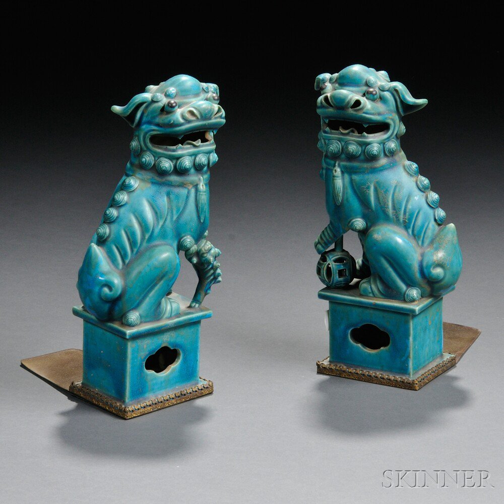 Appraisal: Pair of Turquoise-glazed Buddhist Lions China th th century each