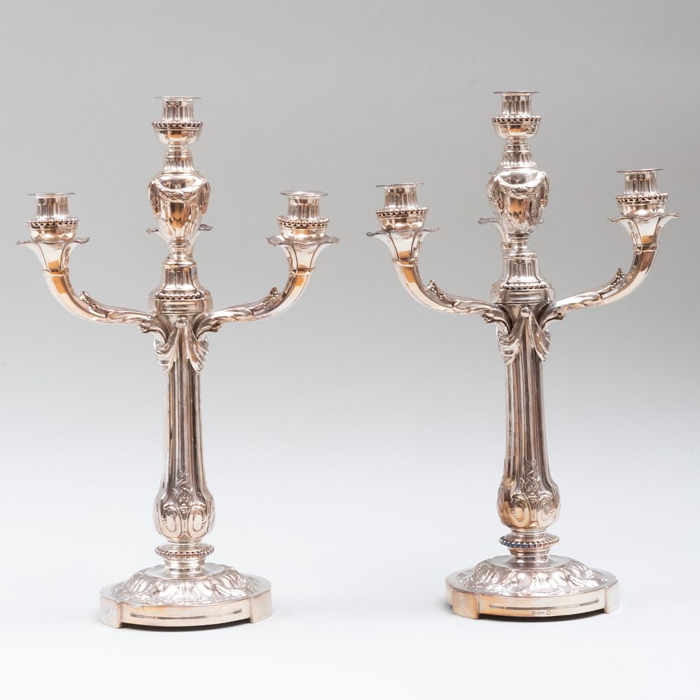 Appraisal: Pair of Neoclassical Style Silver Plate Four Light Candelabra Electrified