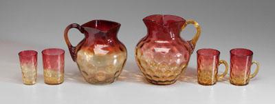 Appraisal: Six pieces amberina thumbprint two pitchers both with reeded handles