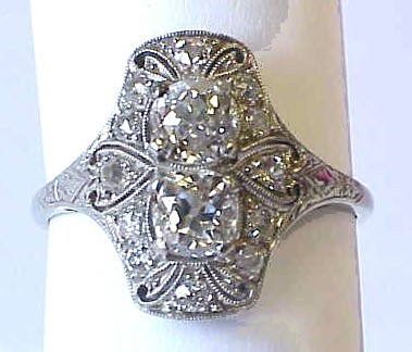 Appraisal: JEWELRY Lady's platinum filigree diamond ring ring is set vertically