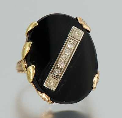 Appraisal: A Two-Color Gold Onyx and Diamond Ring k yellow and